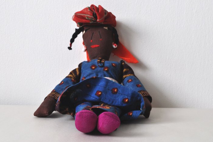 ja-dollsitting Caribbean Doll
